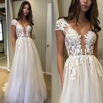 Vasarą V-kaklo Backless Vestuvių Suknelės, Bžūp Rankovėmis-Line Appliqued Tiulio Long Beach Nuotakos Suknelė Boho Ritininės Kamuolys Suknelė Vestuvių 2021